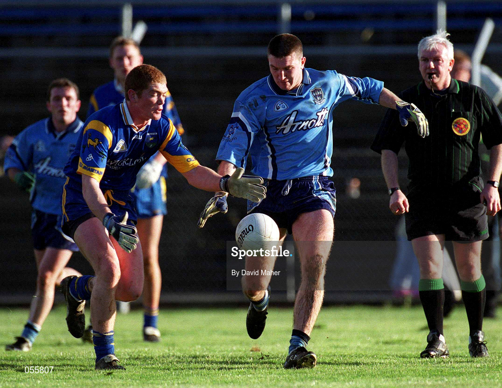 21 January 2001; Darren Homan of Dublin is tackled by David Dillon of Wicklow during the O'Byrne Cup Quarter-Final match between Wicklow and Dublin at the County Grounds in Aughrim, Wicklow. Photo by David Maher/Sportsfile
