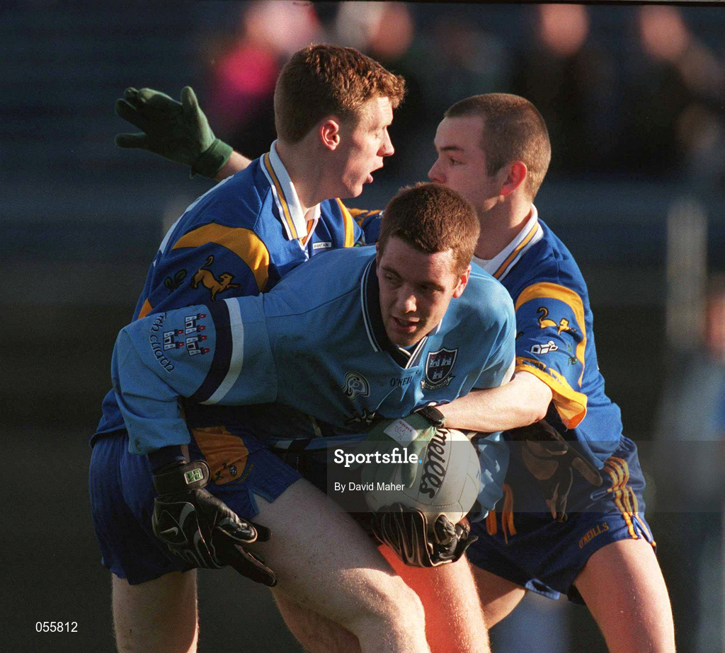 21 January 2001; Kenneth Darcy of Dublin is tackled by Thomas Burke, left and Gary Doran of Wicklow during the O'Byrne Cup Quarter-Final match between Wicklow and Dublin at the County Grounds in Aughrim, Wicklow. Photo by David Maher/Sportsfile