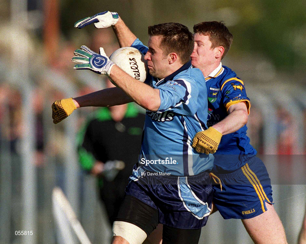 21 January 2001; Morgan Doran of Dublin is tackled by Kieran Foley of Wicklow during the O'Byrne Cup Quarter-Final match between Wicklow and Dublin at the County Grounds in Aughrim, Wicklow. Photo by David Maher/Sportsfile