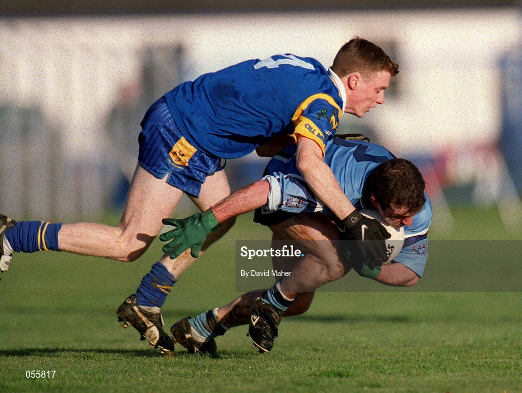 21 January 2001; Niall O'Donoghue of Dublin is tackled by Thomas Burke of Wicklow during the O'Byrne Cup Quarter-Final match between Wicklow and Dublin at the County Grounds in Aughrim, Wicklow. Photo by David Maher/Sportsfile