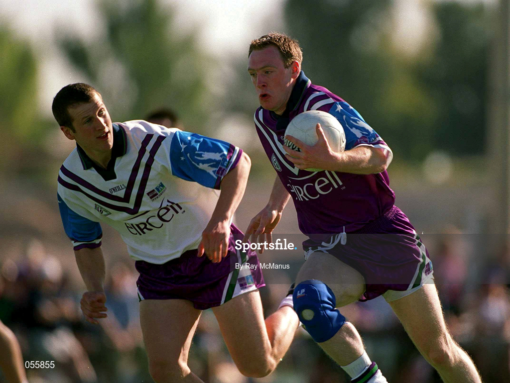 26 January 2001; Philip Clifford of the 1999 Eircell All Stars in action against Gary Fahey of the 2000 Eircell All Stars during the Eircell GAA All Stars Exibition game at Dubai Rugby Ground in Dubai, United Arab Emirates. Photo by Ray McManus/Sportsfile