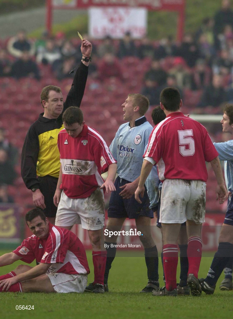 21 January 2001; Richie Foran of Shelbourne argues with referee Dick O'Hanlon after he showed a yellow card to Pat Fenlon of Shelbourne during the Eircom League Premier Division match between Cork City and Shelbourne at Turner's Cross in Cork. Photo by Brendan Moran/Sportsfile