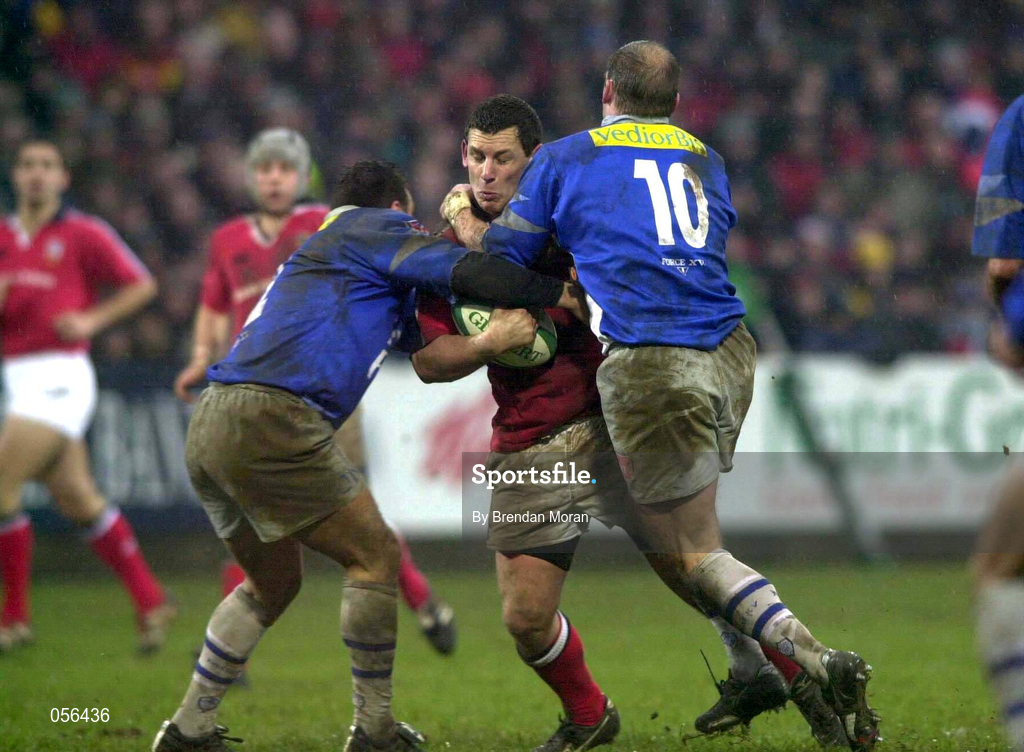 20 January 2001; Jason Holland of Munster is tackled by Damien Denechanny, left, and Gregor Townsend of Castres during the Heineken Cup Pool 4 Round 6 match between Munster and Castres at Musgrave Park in Cork Photo by Brendan Moran/Sportsfile