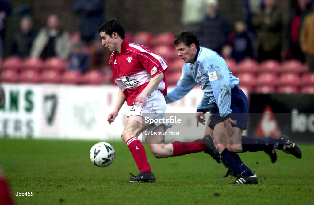 21 January 2001; Tony Tynan of Cork City in action against James Keddy of Shelbourne during the Eircom League Premier Division match between Cork City and Shelbourne at Turner's Cross in Cork. Photo by Brendan Moran/Sportsfile