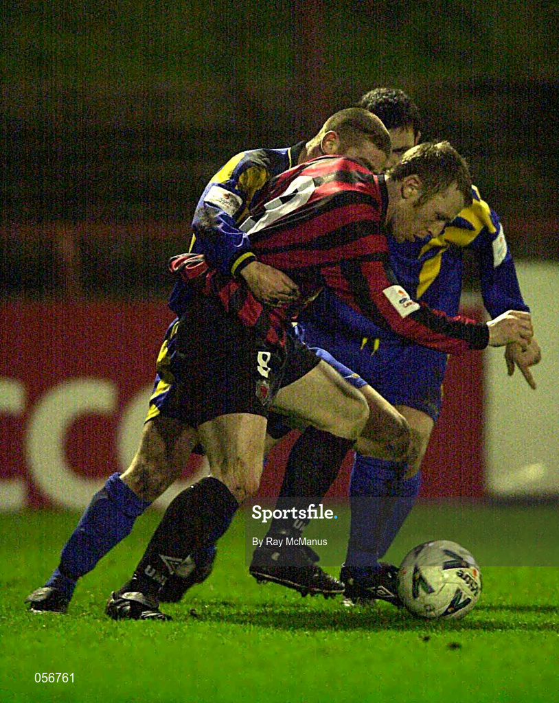 21 December 2000; Trevor Molloy of Bohemians in action against Stephen Gavin of Longford Town during the Eircom League Premier Division match between Bohemians and Longford Town at Dalymount Park in Dublin. Photo by Ray McManus/Sportsfile