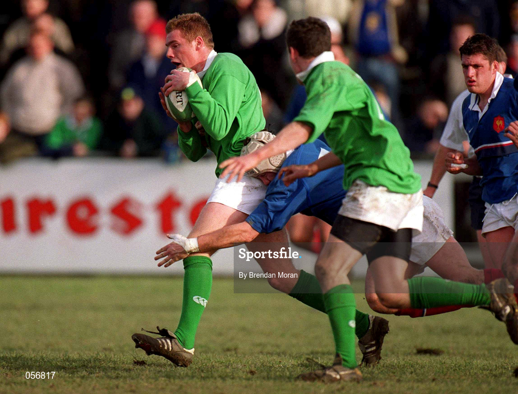 16 February 2001; Gavin Duffy of Ireland is tackled by Christophe Tournier of France during the U21 Rugby International match between Ireland and France at Templeville Road in Dublin. Photo by Brendan Moran/Sportsfile