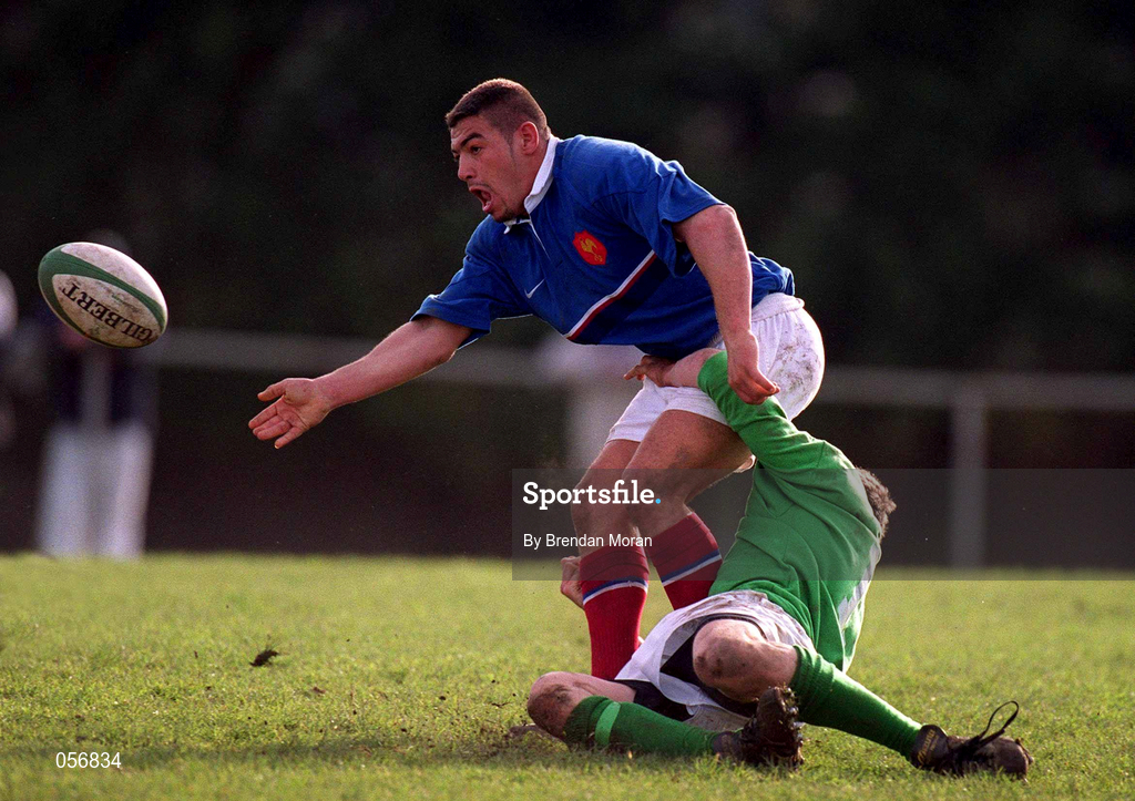 16 February 2001; Rida Jaouher of France is tackled by Kieran Lewis of Ireland during the U21 Rugby International match between Ireland and France at Templeville Road in Dublin. Photo by Brendan Moran/Sportsfile
