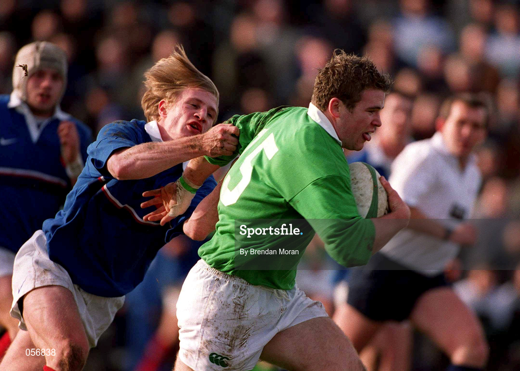 16 February 2001; Gordon D'Arcy of Ireland is tackled by Cedric Savignat of France during the U21 Rugby International match between Ireland and France at Templeville Road in Dublin. Photo by Brendan Moran/Sportsfile