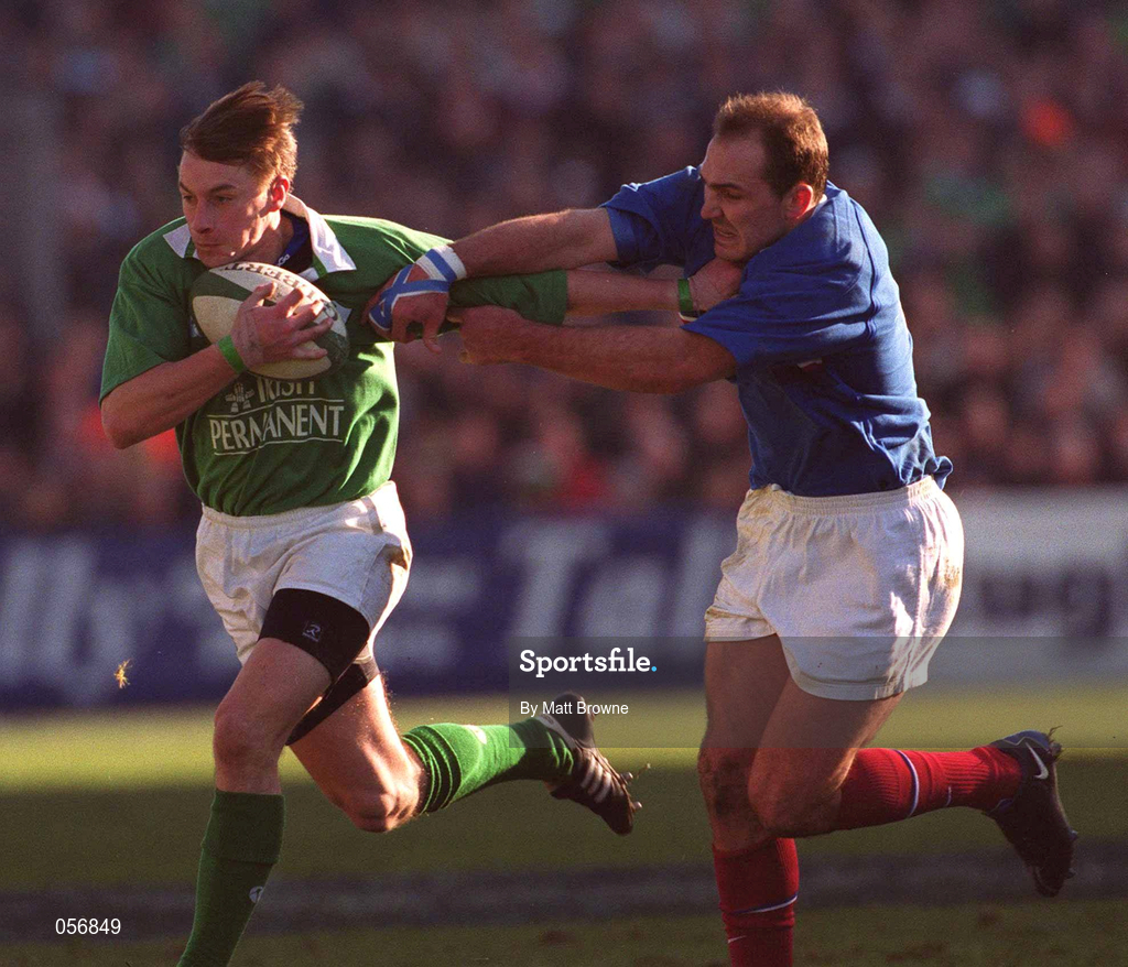17 February 2001; Tyrone Howe of Ireland is tackled by Richard Dourthe of France during the Lloyds TSB Six Nations Rugby Championship match between Ireland and France at Lansdowne Road in Dublin. Photo by Matt Browne/Sportsfile