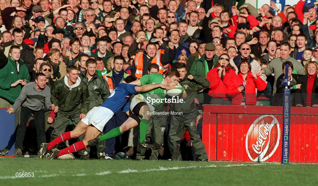 17 February 2001; Brian O'Driscoll of Ireland goes over for a try despite the efforts of Xavier Garabajosa of France during the Lloyds TSB Six Nations Rugby Championship match between Ireland and France at Lansdowne Road in Dublin. Photo by Brendan Moran/Sportsfile