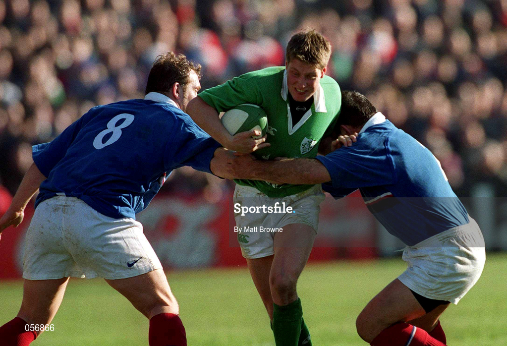 17 February 2001; Ronan O'Gara of Ireland is tackled by Olivier Magne, left, and Raphael Ibanez of France during the Lloyds TSB Six Nations Rugby Championship match between Ireland and France at Lansdowne Road in Dublin. Photo by Matt Browne/Sportsfile