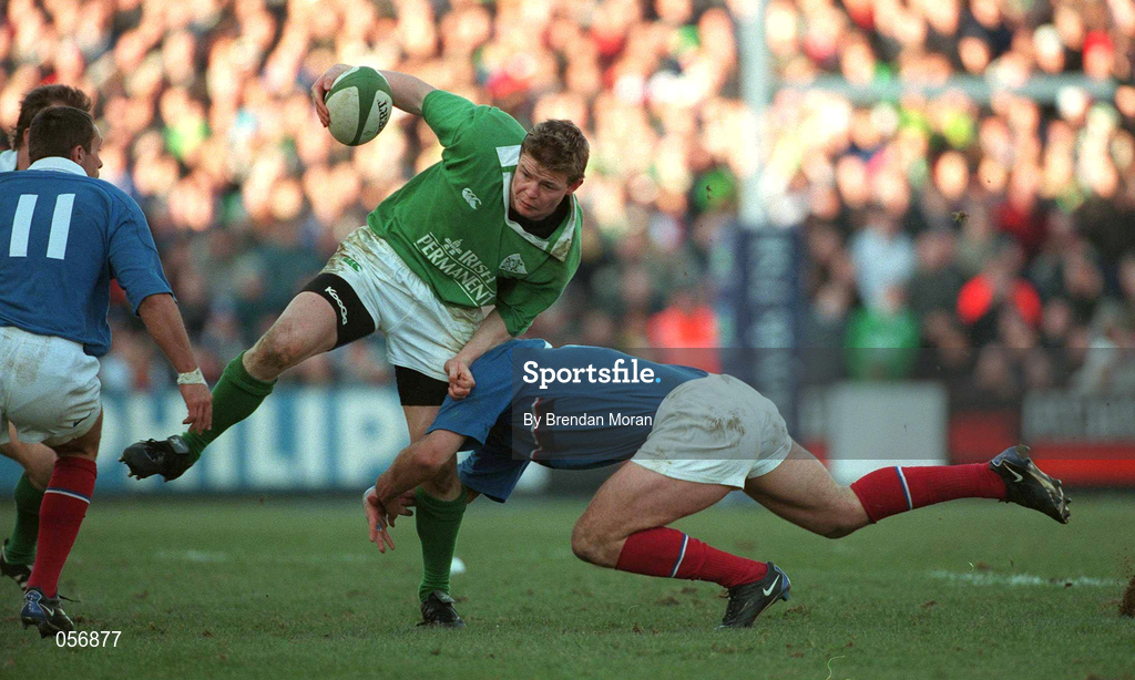 17 February 2001; Brian O'Driscoll of Ireland is tackled by Richard Dourthe of France during the Lloyds TSB Six Nations Rugby Championship match between Ireland and France at Lansdowne Road in Dublin. Photo by Brendan Moran/Sportsfile