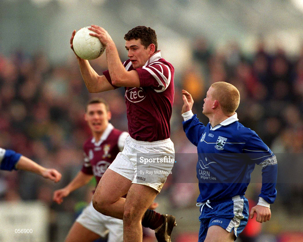18 February 2001; Enda Lavelle of Crossmolina Deel Rovers is tackled by Gareth Doherty of Bellaghy Wolfe Tones during the AIB All-Ireland Senior Club Football Championship Semi-Final match between Crossmolina Deel Rovers v Bellaghy Wolfe Tones at Brewster Park in Enniskillen, Fermanagh. Photo by Ray McManus/Sportsfile