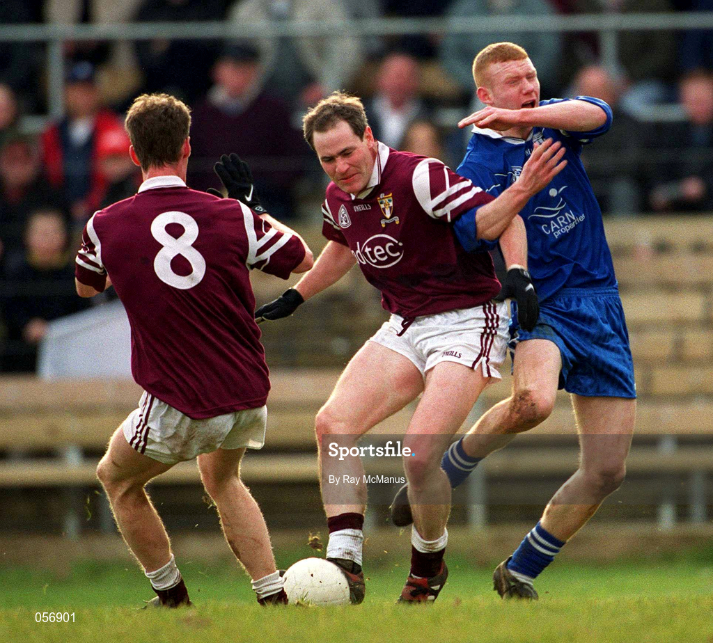 18 February 2001; Tom Nallen, centre, and James Nallen of Crossmolina Deel Rovers in action against Fergal Doherty of Bellaghy Wolfe Tones during the AIB All-Ireland Senior Club Football Championship Semi-Final match between Crossmolina Deel Rovers v Bellaghy Wolfe Tones at Brewster Park in Enniskillen, Fermanagh. Photo by Ray McManus/Sportsfile