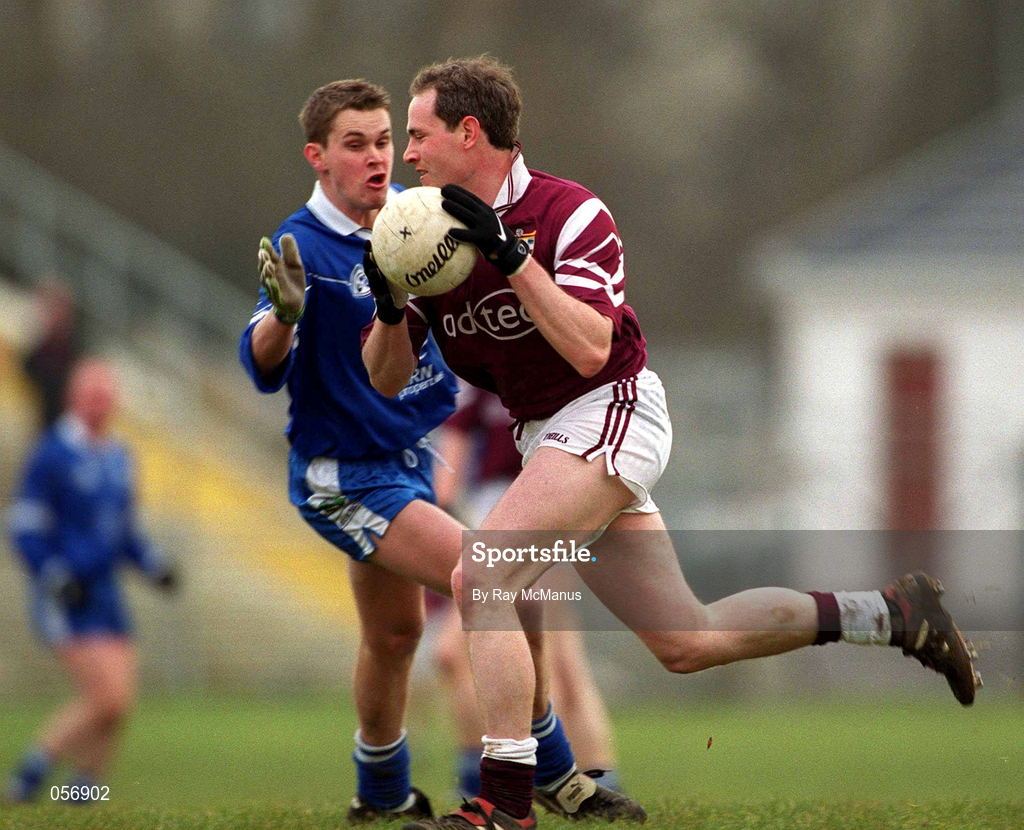18 February 2001; Tom Nallen of Crossmolina Deel Rovers is tackled by Gavin Diamond of Bellaghy Wolfe Tones during the AIB All-Ireland Senior Club Football Championship Semi-Final match between Crossmolina Deel Rovers v Bellaghy Wolfe Tones at Brewster Park in Enniskillen, Fermanagh. Photo by Ray McManus/Sportsfile