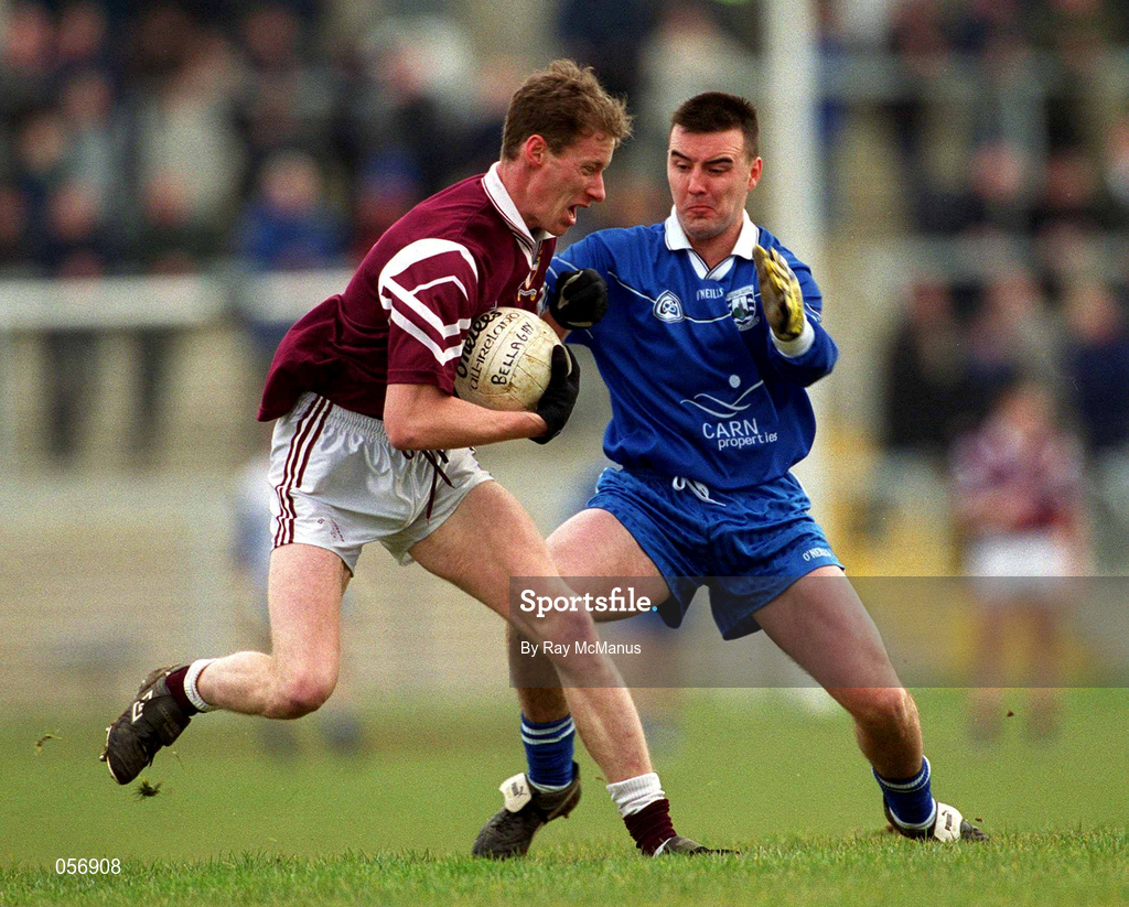 18 February 2001; James Nallen of Crossmolina Deel Rovers is tackled by Cathal Scullion of Bellaghy Wolfe Tones during the AIB All-Ireland Senior Club Football Championship Semi-Final match between Crossmolina Deel Rovers v Bellaghy Wolfe Tones at Brewster Park in Enniskillen, Fermanagh. Photo by Ray McManus/Sportsfile