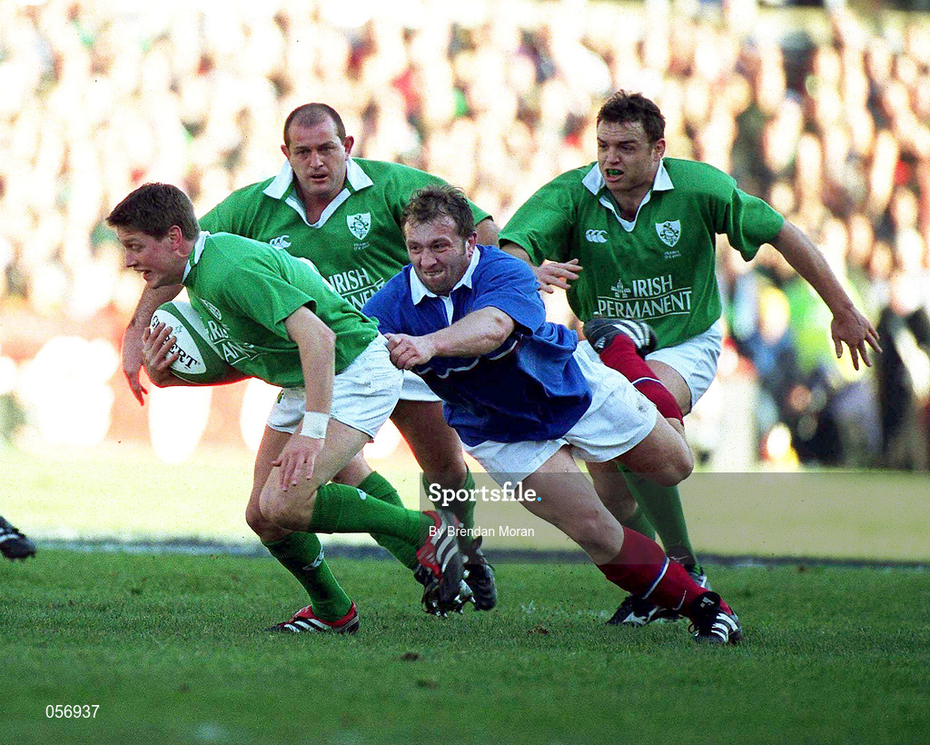 17 February 2001; Ronan O'Gara of Ireland is tackled by Olivier Magne of France during the Lloyds TSB Six Nations Rugby Championship match between Ireland and France at Lansdowne Road in Dublin. Photo by Brendan Moran/Sportsfile