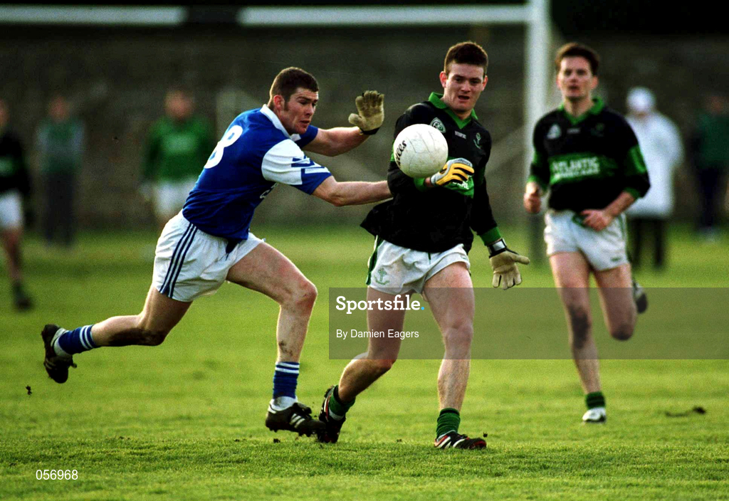 18 February 2001; Derek Kavanagh of Nemo Rangers is tackled by Philip Nolan of O'Hanrahan's during the AIB All-Ireland Senior Club Football Championship Semi-Final match between Nemo Rangers and O'Hanrahan's at Clonmel Sportsfield in Clonmel, Tipperary. Photo by Damien Eagers/Sportsfile