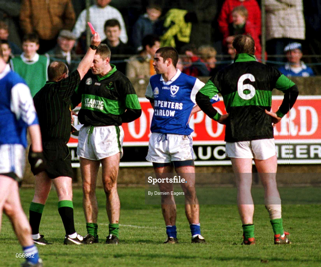 18 February 2001; Referee Brendan Gorman shows a red card to Larry Kavanagh of Nemo Rangers during the AIB All-Ireland Senior Club Football Championship Semi-Final match between Nemo Rangers and O'Hanrahan's at Clonmel Sportsfield in Clonmel, Tipperary. Photo by Damien Eagers/Sportsfile