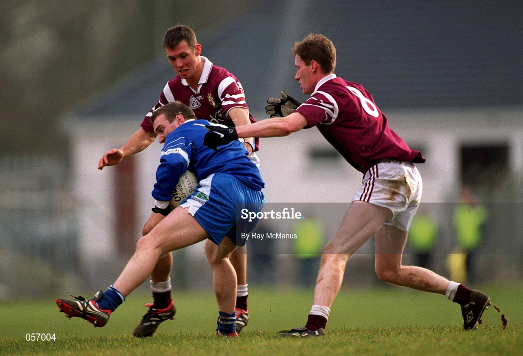 18 February 2001; Karl Diamond of Bellaghy Wolfe Tones is tackled by Crossmolina's Michael Moyles, left, and James Nallen of Crossmolina Deel Rovers during the AIB All-Ireland Senior Club Football Championship Semi-Final match between Crossmolina Deel Rovers v Bellaghy Wolfe Tones at Brewster Park in Enniskillen, Fermanagh. Photo by Ray McManus/Sportsfile