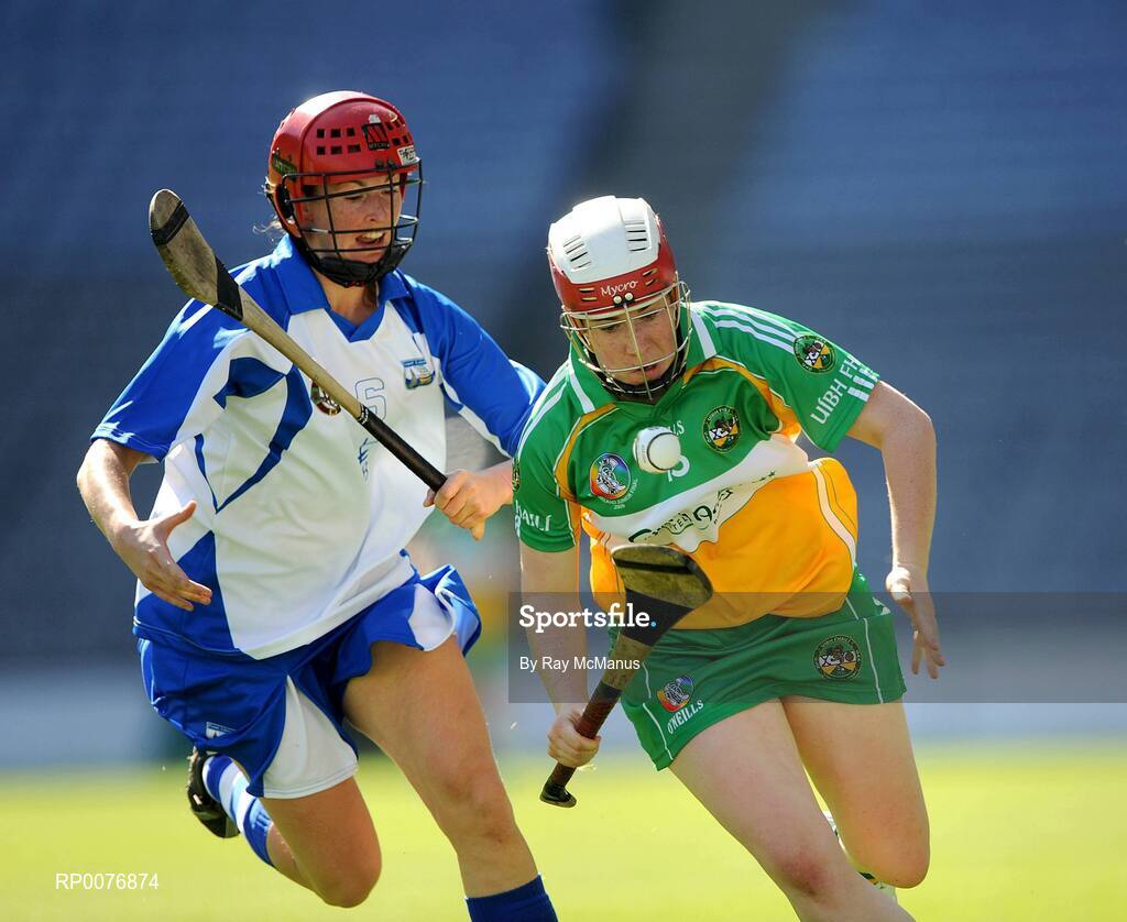 13 September 2009; Siobhán Flannery, Offaly, in action against Mary O'Donnell, Waterford. Gala All-Ireland Junior Camogie Championship Final, Offaly v Waterford, Croke Park, Dublin. Picture credit: Ray McManus / SPORTSFILE