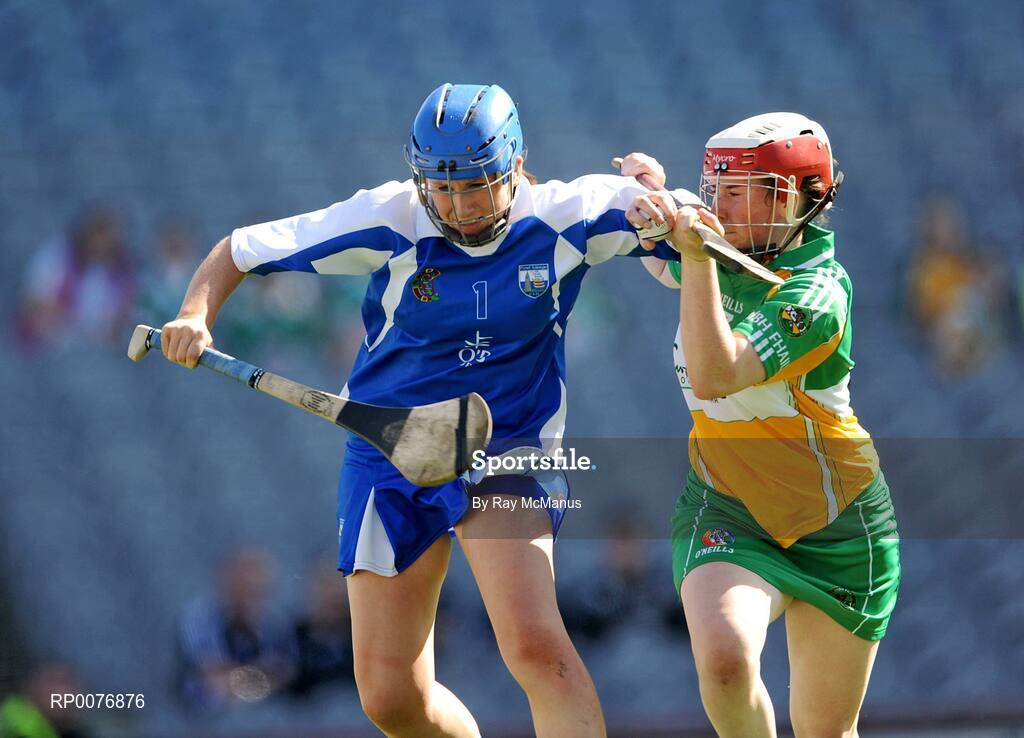 13 September 2009; Ashling O'Brien, Waterford, is tackled by Siobhán Flannery, Offaly. Gala All-Ireland Junior Camogie Championship Final, Offaly v Waterford, Croke Park, Dublin. Picture credit: Ray McManus / SPORTSFILE