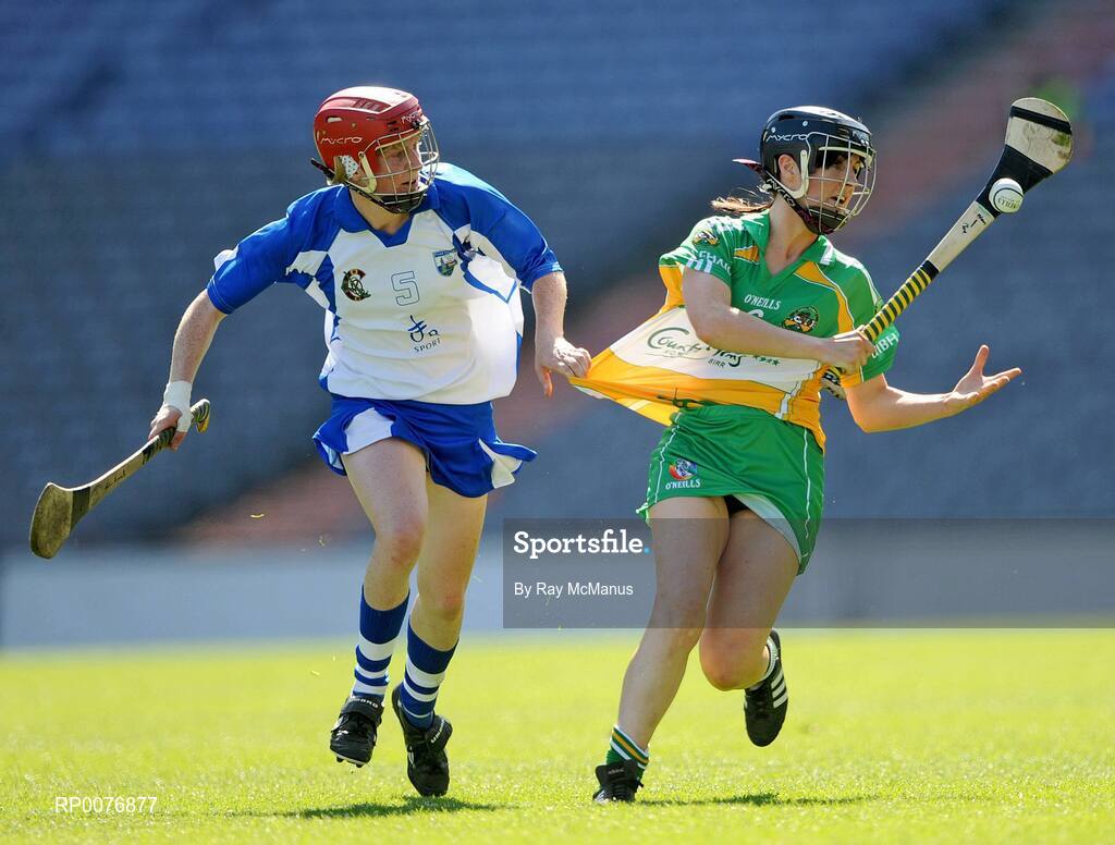 13 September 2009; Marion Crean, Offaly, is tackled by Gráinne Kenneally, Waterford. Gala All-Ireland Junior Camogie Championship Final, Offaly v Waterford, Croke Park, Dublin. Picture credit: Ray McManus / SPORTSFILE