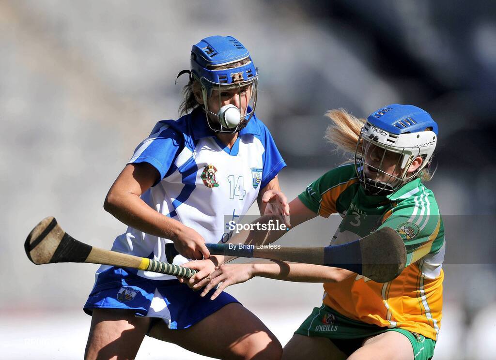 13 September 2009; Karen Kelly, Waterford, in action against Lorraine Keena, Offaly. Gala All-Ireland Junior Camogie Championship Final, Offaly v Waterford, Croke Park, Dublin. Picture credit: Brian Lawless / SPORTSFILE