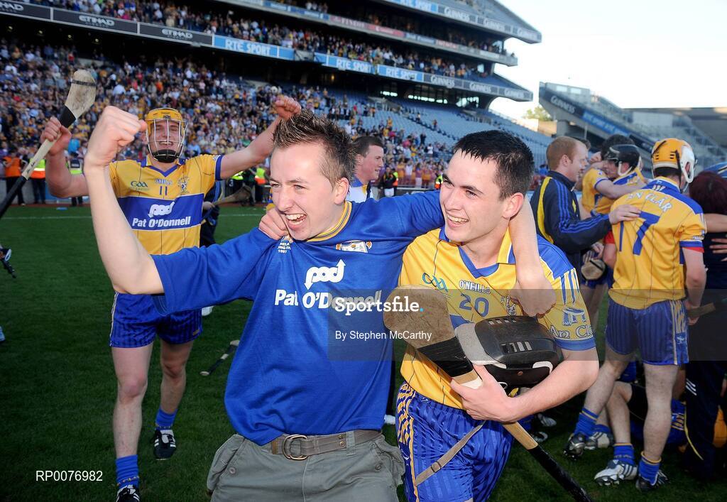 13 September 2009; Eoin Hayes, Clare, celebrates with a supporter after his side's victory. Bord Gais Energy GAA All-Ireland U21 Hurling Championship Final, Clare v Kilkenny, Croke Park, Dublin. Picture credit: Stephen McCarthy / SPORTSFILE