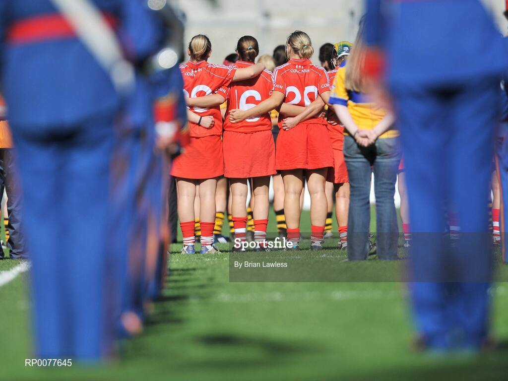 13 September 2009; Cork players stand for the national anthem. Gala All-Ireland Senior Camogie Championship Final, Cork v Kilkenny, Croke Park, Dublin. Picture credit: Brian Lawless / SPORTSFILE
