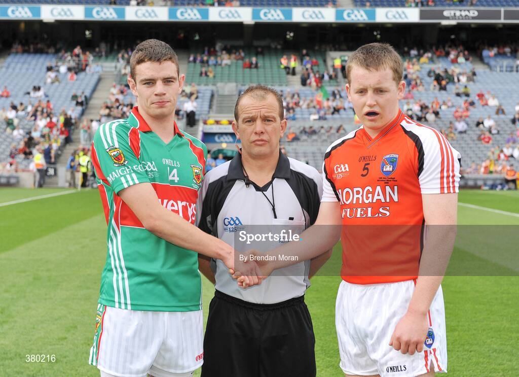 20 September 2009; Team captains Aidan Walsh, Mayo, and Declan Mckenna, Armagh, shake hands in the company of referee Eddie Kinsella. ESB GAA Football All-Ireland Minor Championship Final, Armagh v Mayo, Croke Park, Dublin. Picture credit: Brendan Moran / SPORTSFILE