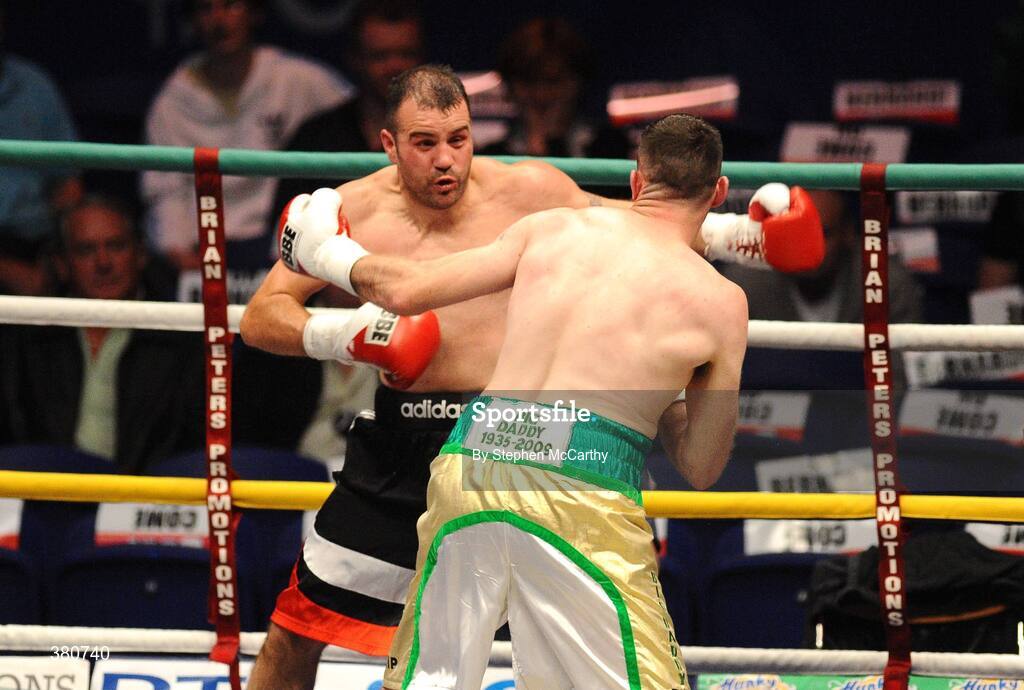 26 September 2009; Jamie Power, left, in action against Michael Sweeney during their International Light Heavyweight bout. Hunky Dorys Fight Night Undercard, The O2, Dublin. Picture credit: Stephen McCarthy / SPORTSFILE