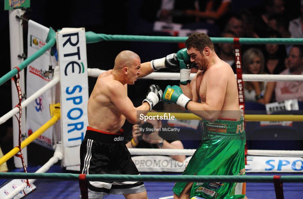 26 September 2009; Tomas Mrazek, left, exchanges punches with Tyson Fury during the first round of their International Heavyweight bout. Hunky Dorys Fight Night Undercard, The O2, Dublin. Picture credit: Stephen McCarthy / SPORTSFILE