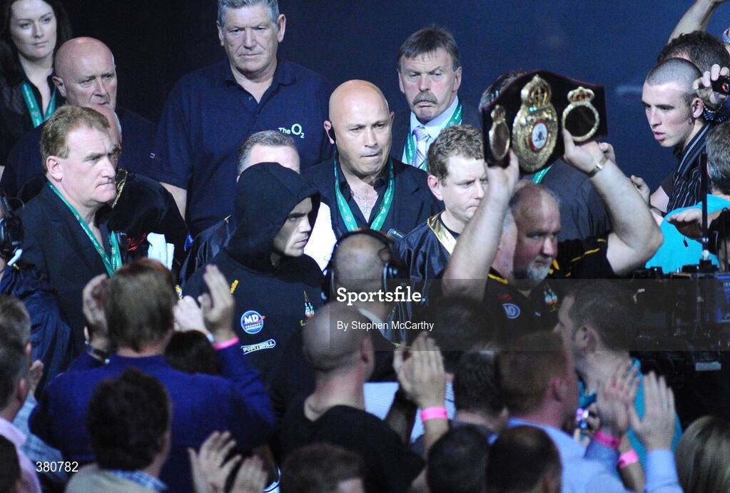 26 September 2009; Bernard Dunne is led into the ring for the WBA World Super Bantamweight title fight. Hunky Dorys World Title Fight Night, Bernard Dunne v Poonsawat Kratingdaenggym, The O2, Dublin. Picture credit: Stephen McCarthy / SPORTSFILE