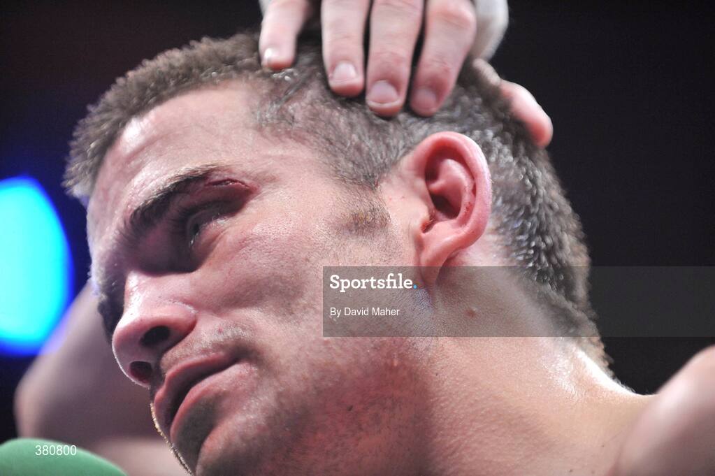 26 September 2009; A dejected Bernard Dunne after losing the WBA World Super Bantamweight title to Poonsawat Kratingdaenggym. Hunky Dorys World Title Fight Night, Bernard Dunne v Poonsawat Kratingdaenggym, The O2, Dublin. Picture credit: David Maher / SPORTSFILE