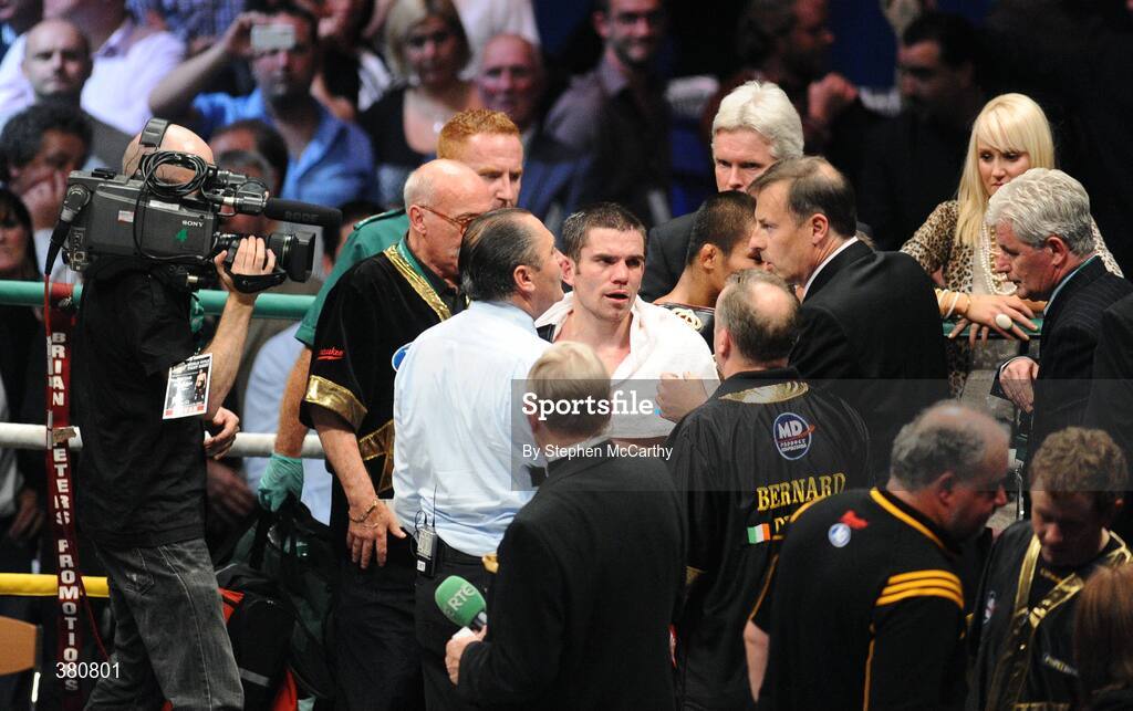 26 September 2009; A dejected Bernard Dunne after being defeated by Poonsawat Kratingdaenggym on the three knockdown rule after 2 minutes 57 seconds of the third round of their WBA World Super Bantamweight title fight. Hunky Dorys World Title Fight Night, Bernard Dunne v Poonsawat Kratingdaenggym, The O2, Dublin. Picture credit: Stephen McCarthy / SPORTSFILE