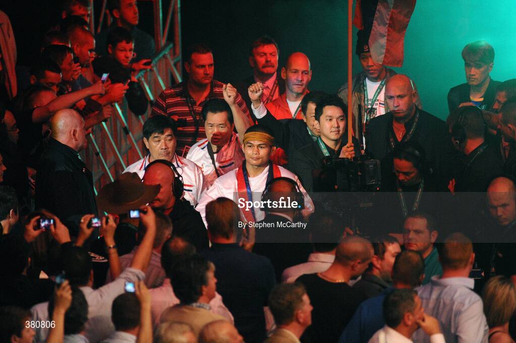 26 September 2009; Poonsawat Kratingdaenggym makes his way to the ring ahead of his WBA World Super Bantamweight title fight, with Bernard Dunne. Hunky Dorys World Title Fight Night, Bernard Dunne v Poonsawat Kratingdaenggym, The O2, Dublin. Picture credit: Stephen McCarthy / SPORTSFILE
