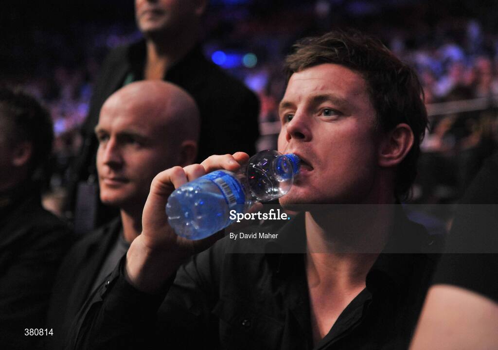 26 September 2009; Ireland rugby captain Brian O'Driscoll watches on during the Bernard Dunne and Poonsawat Kratingdaenggym WBA World Super Bantamweight title fight. Hunky Dorys World Title Fight Night, Bernard Dunne v Poonsawat Kratingdaenggym, The O2, Dublin. Picture credit: David Maher / SPORTSFILE