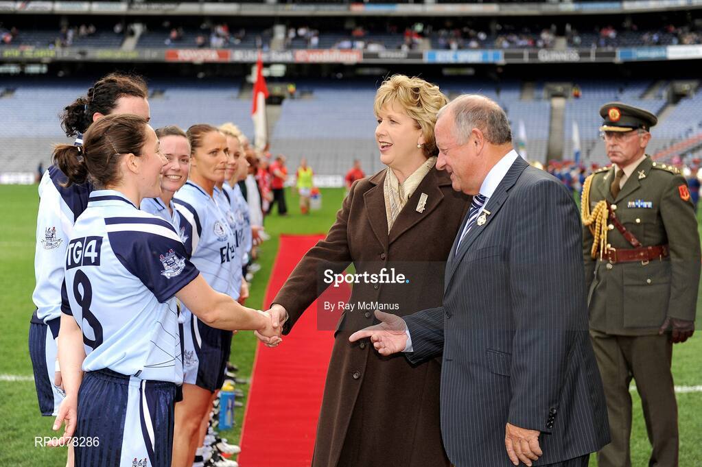 27 September 2009; Dublin captain Denise Masterson is introduced to the President of Ireland, Mary McAleese, by the President of the Ladies Football Assiociation, Pat Quill, before the game. TG4 All-Ireland Ladies Football Senior Championship Final, Cork v Dublin, Croke Park, Dublin. Picture credit: Ray McManus / SPORTSFILE