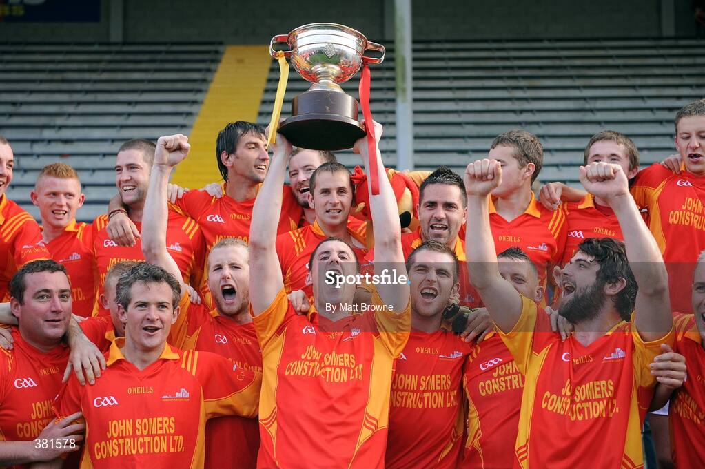 4 October 2009; Horeswood captain Thomas Howlin lifts the cup and celebrates with his team-mates. Wexford County Senior Football Final, Horeswood v St Anne's, Wexford Park, Wexford. Picture credit: Matt Browne / SPORTSFILE