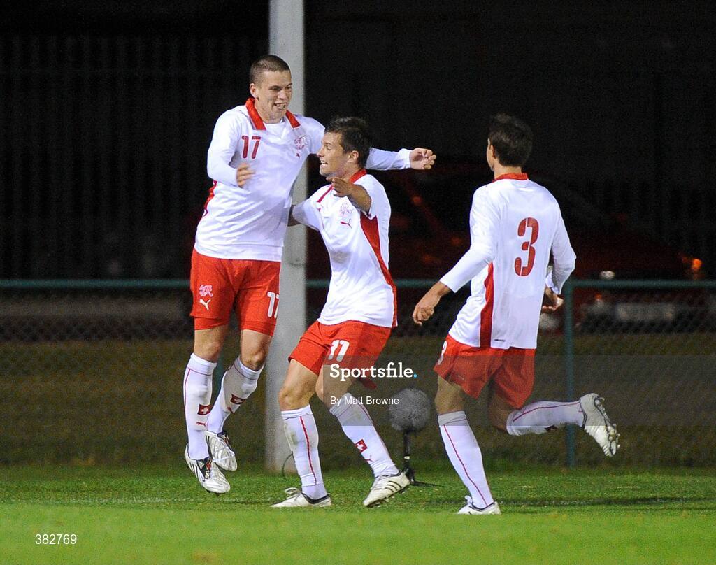 13 October 2009; Switzerland's Fabien Frei, 17, celebrates his goal with team-mates Valentin Stocker and Philippe Koch, 3. UEFA European U21 Championship Qualifier, Republic of Ireland v Switzerland, RSC, Waterford. Picture credit: Matt Browne / SPORTSFILE