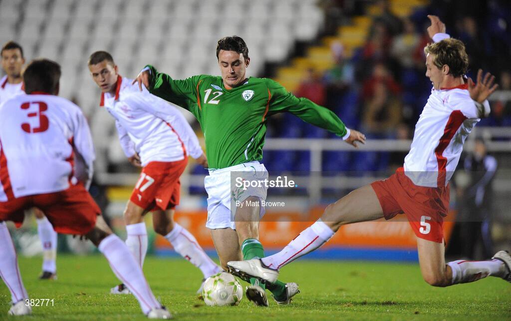 13 October 2009; Keith Treacy, Republic of Ireland, is tackled by Francois Affolter, Switzerland. UEFA European U21 Championship Qualifier, Republic of Ireland v Switzerland, RSC, Waterford. Picture credit: Matt Browne / SPORTSFILE