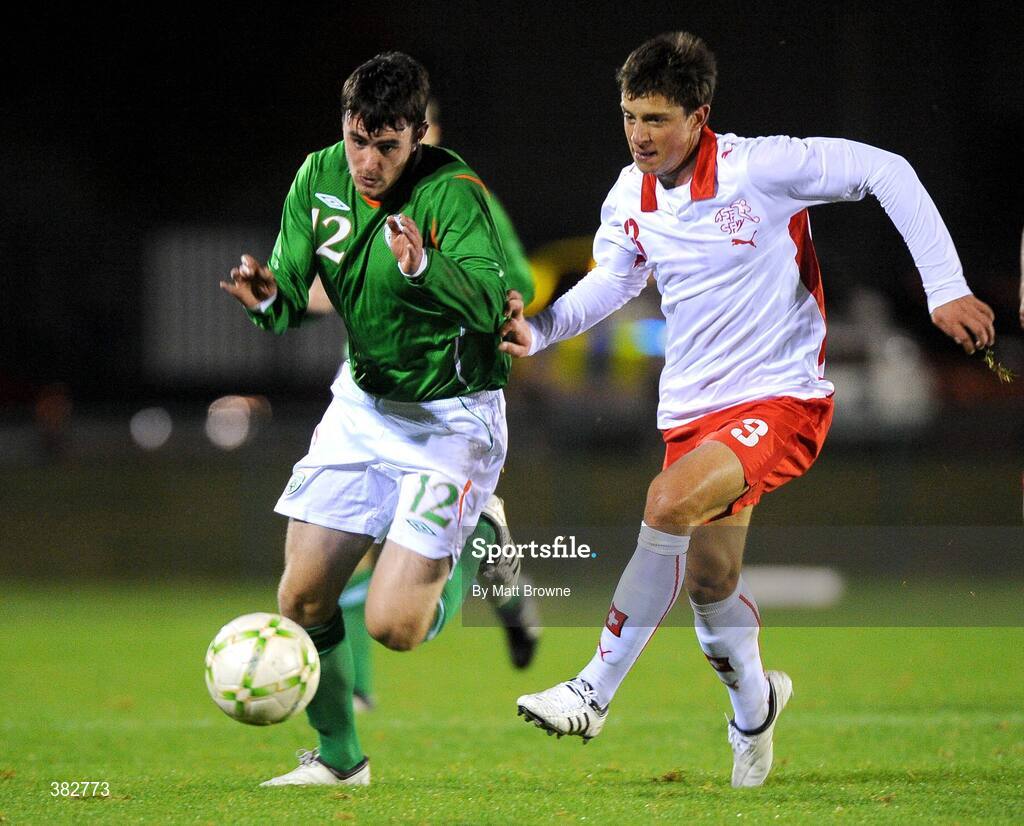 13 October 2009; Keith Treacy, Republic of Ireland, is tackled by Philippe Koch, Switzerland. UEFA European U21 Championship Qualifier, Republic of Ireland v Switzerland, RSC, Waterford. Picture credit: Matt Browne / SPORTSFILE
