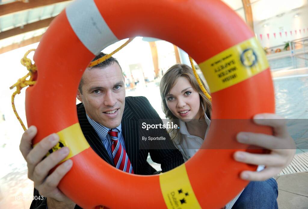 12 October 2009; Former Dublin footballer Ciarán Whelan with Irish Olympian Aisling Cooney at the launch of Santa Swim 2009. Ballymun and Finglas Leisure Centre, Ballymun Road, Dublin. Photo by Sportsfile