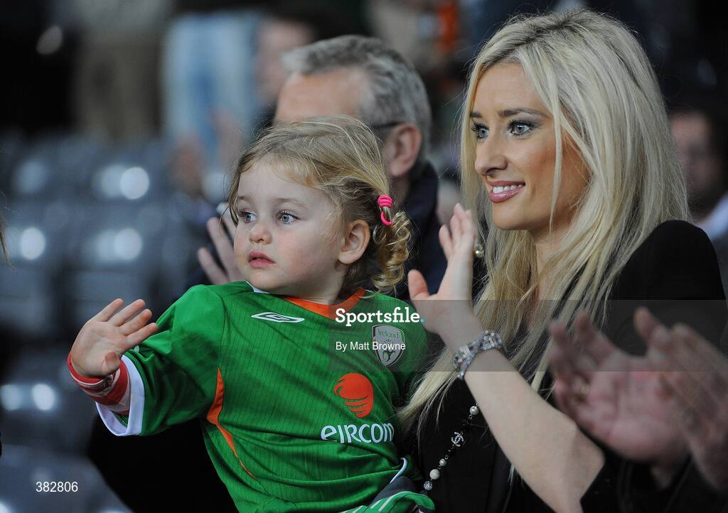 14 October 2009; Republic of Ireland goalkeeper Shay Given's wife Jane and their daughter Sienna wave to him before the start of the game which marks his 100th cap for his country. 2010 FIFA World Cup Qualifier, Republic of Ireland v Montenegro, Croke Park, Dublin. Picture credit: Matt Browne / SPORTSFILE