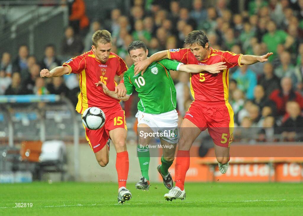 14 October 2009; Robbie Keane, Republic of Ireland, in action against Milorad Pekovic and Radoslav Batak, Montenegro. 2010 FIFA World Cup Qualifier, Republic of Ireland v Montenegro, Croke Park, Dublin. Picture credit: Oliver McVeigh / SPORTSFILE