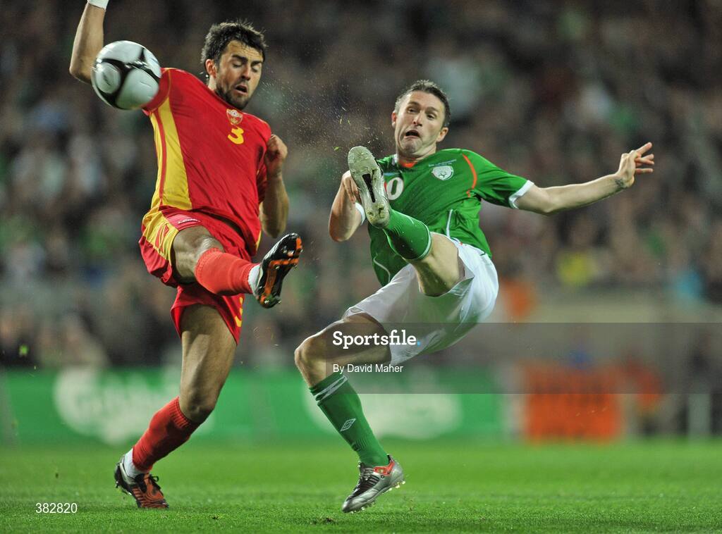 14 October 2009; Robbie Keane, Republic of Ireland, in action against Marko Basa, Montenegro. 2010 FIFA World Cup Qualifier, Republic of Ireland v Montenegro, Croke Park, Dublin. Picture credit: David Maher / SPORTSFILE