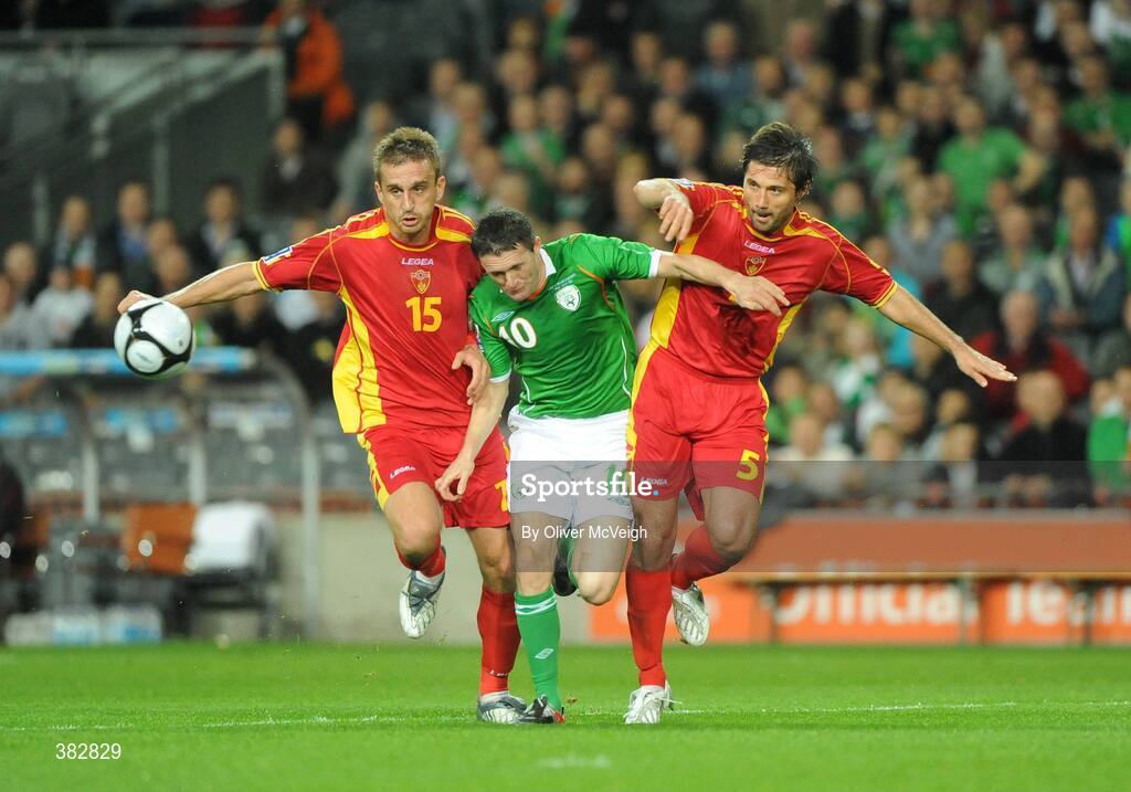 14 October 2009; Robbie Keane, Republic of Ireland, in action against Milorad Pekovic and Radoslav Batak, Montenegro. 2010 FIFA World Cup Qualifier, Republic of Ireland v Montenegro, Croke Park, Dublin. Picture credit: Oliver McVeigh / SPORTSFILE