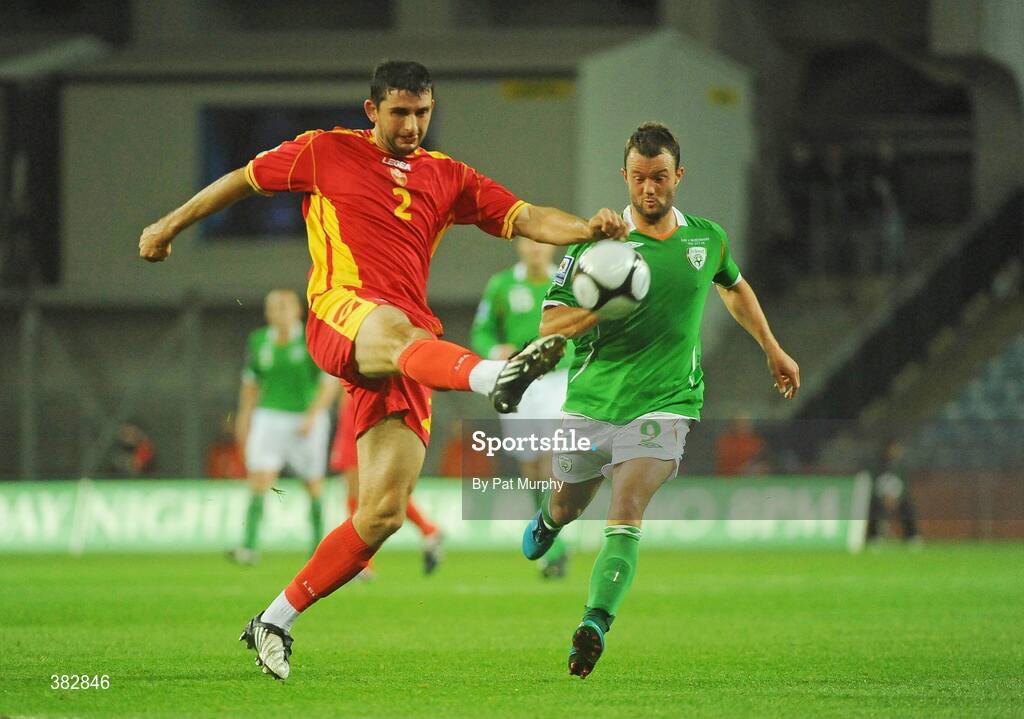 14 October 2009; Miodrag Dzudovic, Montenegro, in action against Noel Hunt, Republic of Ireland. 2010 FIFA World Cup Qualifier, Republic of Ireland v Montenegro, Croke Park, Dublin. Picture credit: Pat Murphy / SPORTSFILE