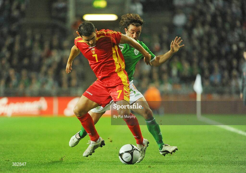 14 October 2009; Simon Vukcevic, Montenegro, in action against Stephen Hunt, Republic of Ireland. 2010 FIFA World Cup Qualifier, Republic of Ireland v Montenegro, Croke Park, Dublin. Picture credit: Pat Murphy / SPORTSFILE